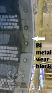 Bi-metallic trunnion liner wear block
